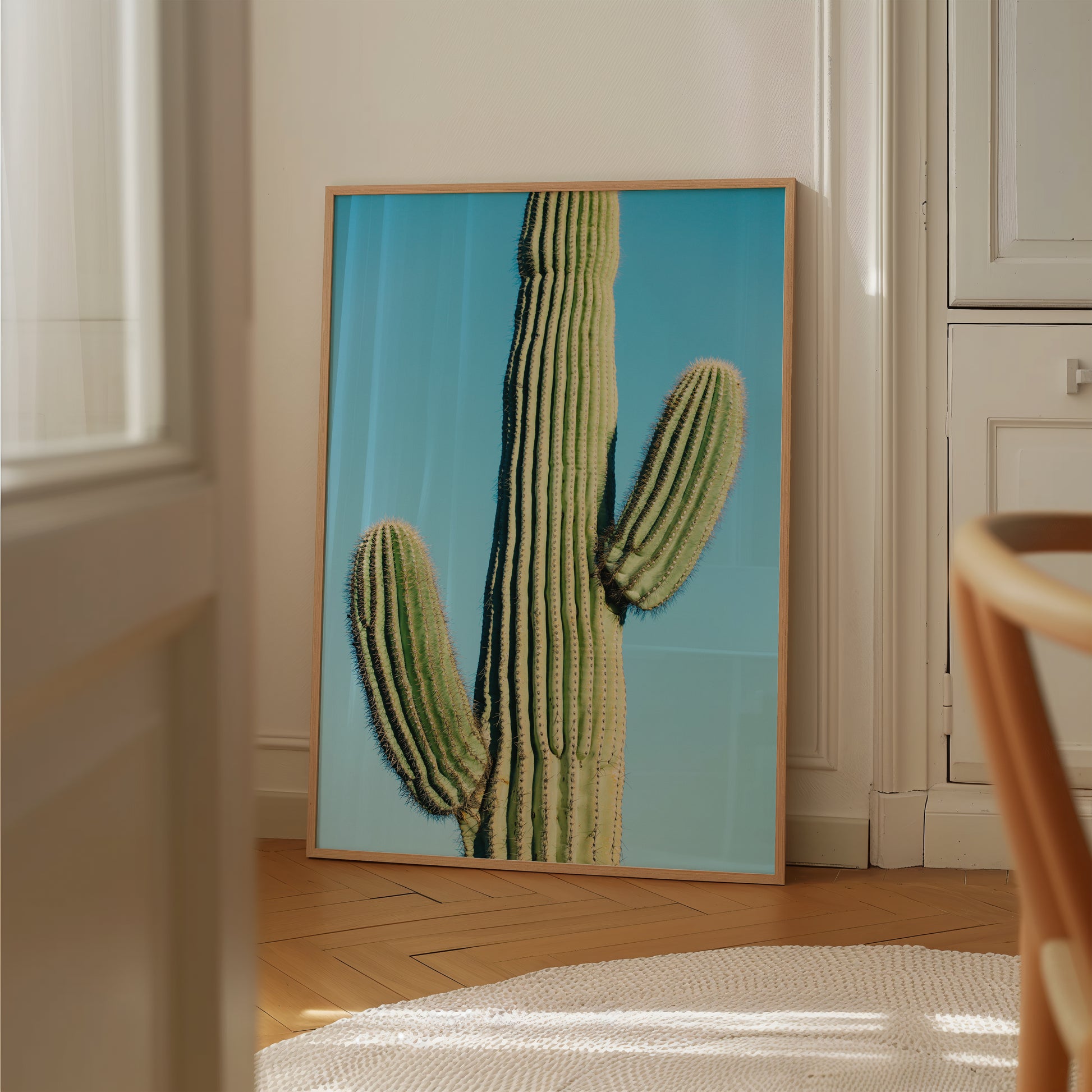 bright bold saguaro against a blue sky minimalist modern wall art by denise crew