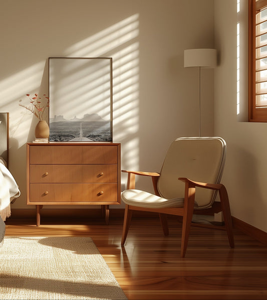 ROAD TRiP black-and-white photo of an open road and Monument Valley art print in a modern minimalist room.