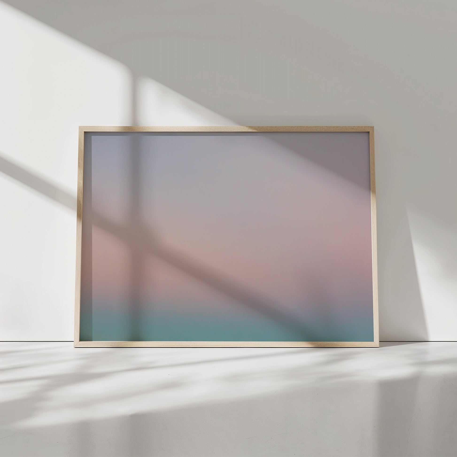 ALL SAiNTS SUNSET pastel gradient art print with calming coral, pink, lavender, blue, and aqua tones in a wooden frame.