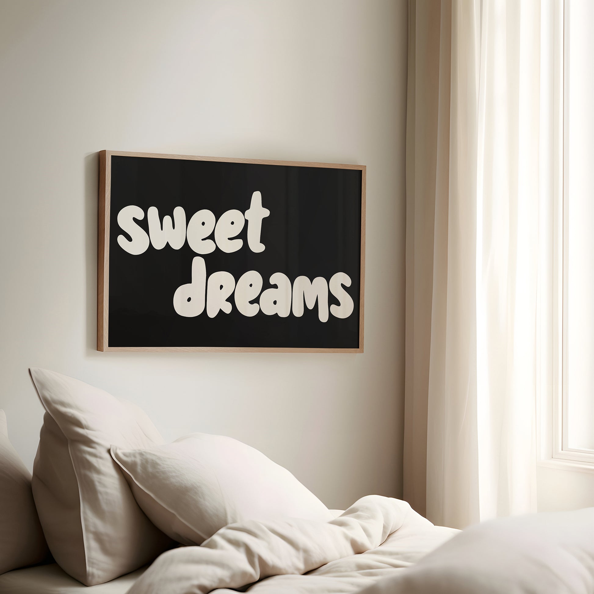 SWEET DREAMS" poster with soft white bubbly lettering on black, perfect for cozy bedrooms or nurseries.