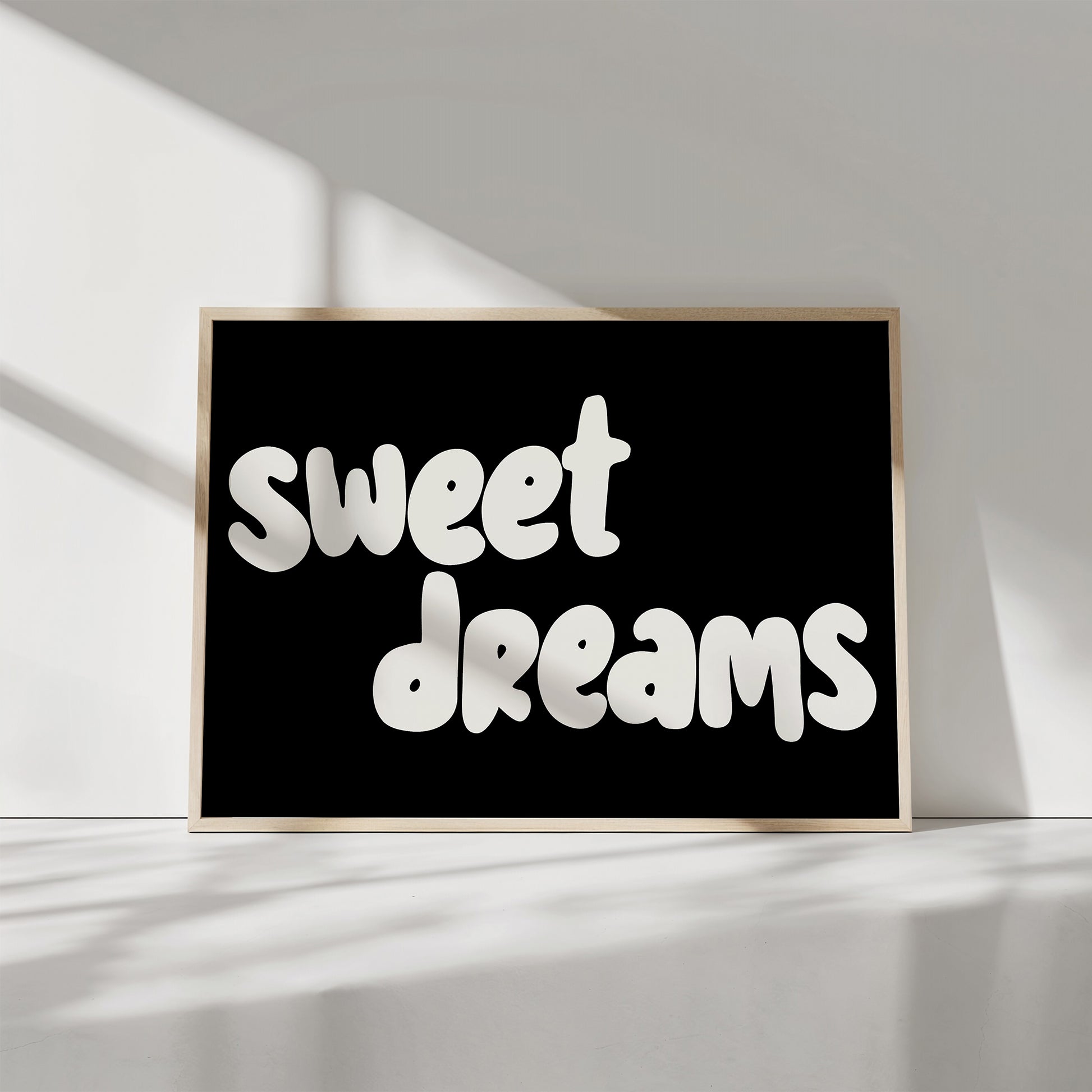 SWEET DREAMS poster with bubbly white text on black background, perfect for child's bedroom or nursery decor.
