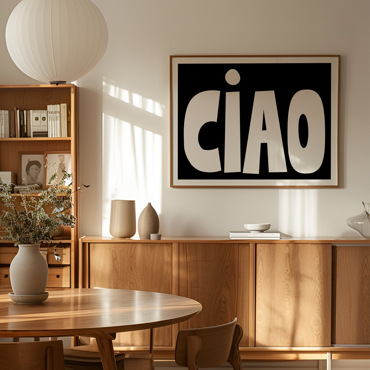 CiAO bold art print with oversized white letters on black, stylish Italian-inspired wall poster in modern dining room.