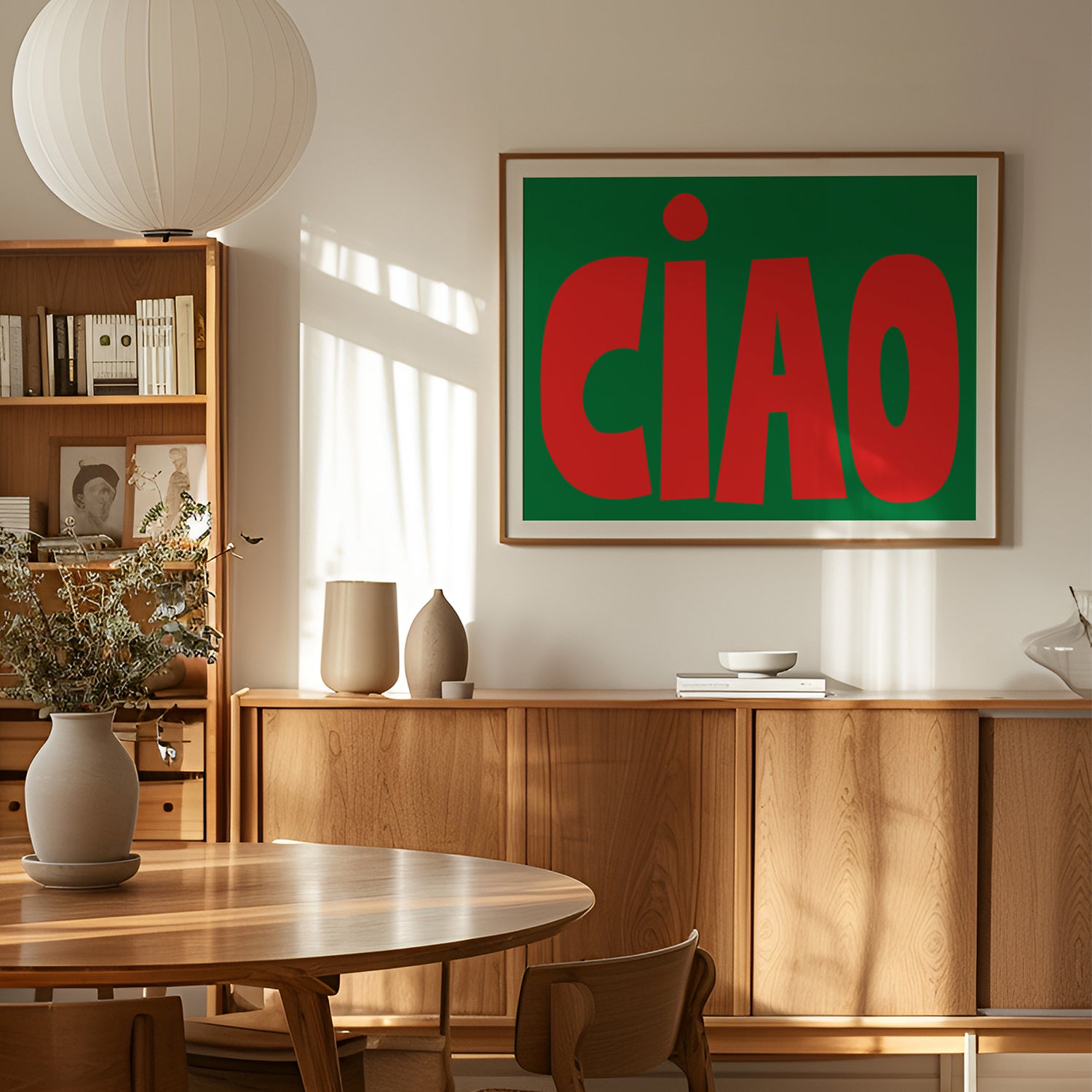 CiAO / RED on GREEN poster featuring bold red letters on a green background in a modern dining room setting.