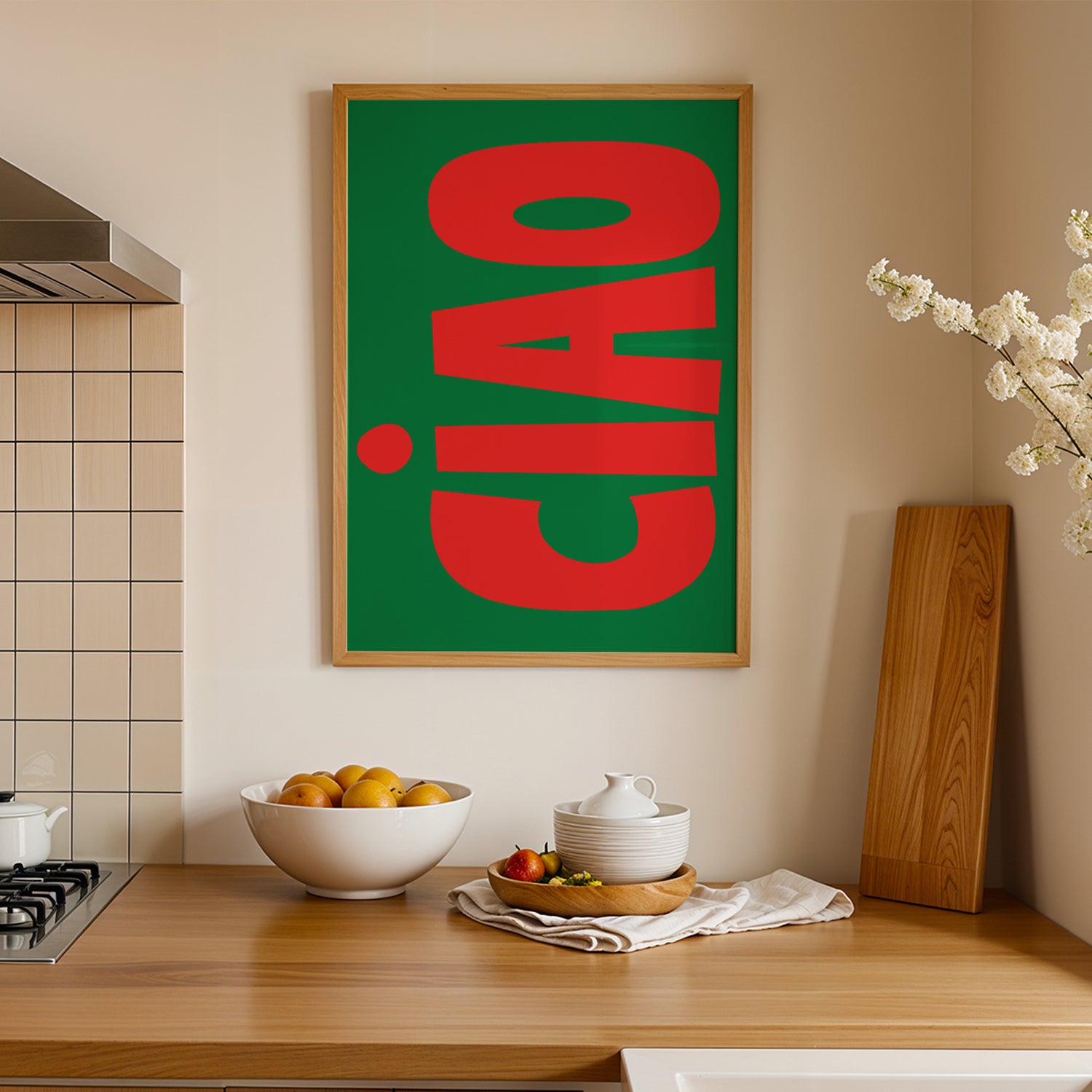 CiAO / RED on GREEN poster with bold red letters on green background in modern kitchen interior wall decor.