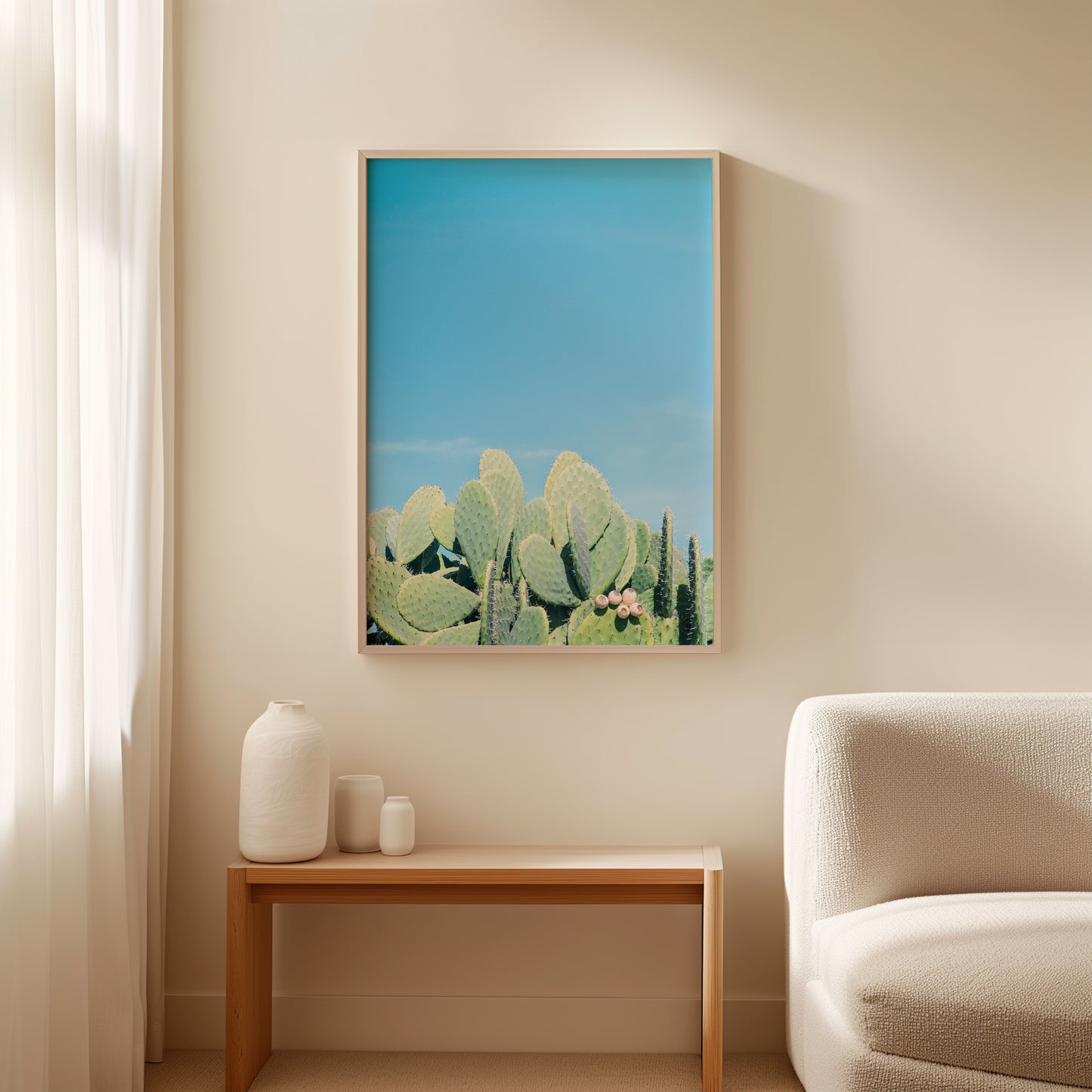 DAYDREAM print featuring prickly pear cacti beneath a bright blue sky in a minimalist interior setting.