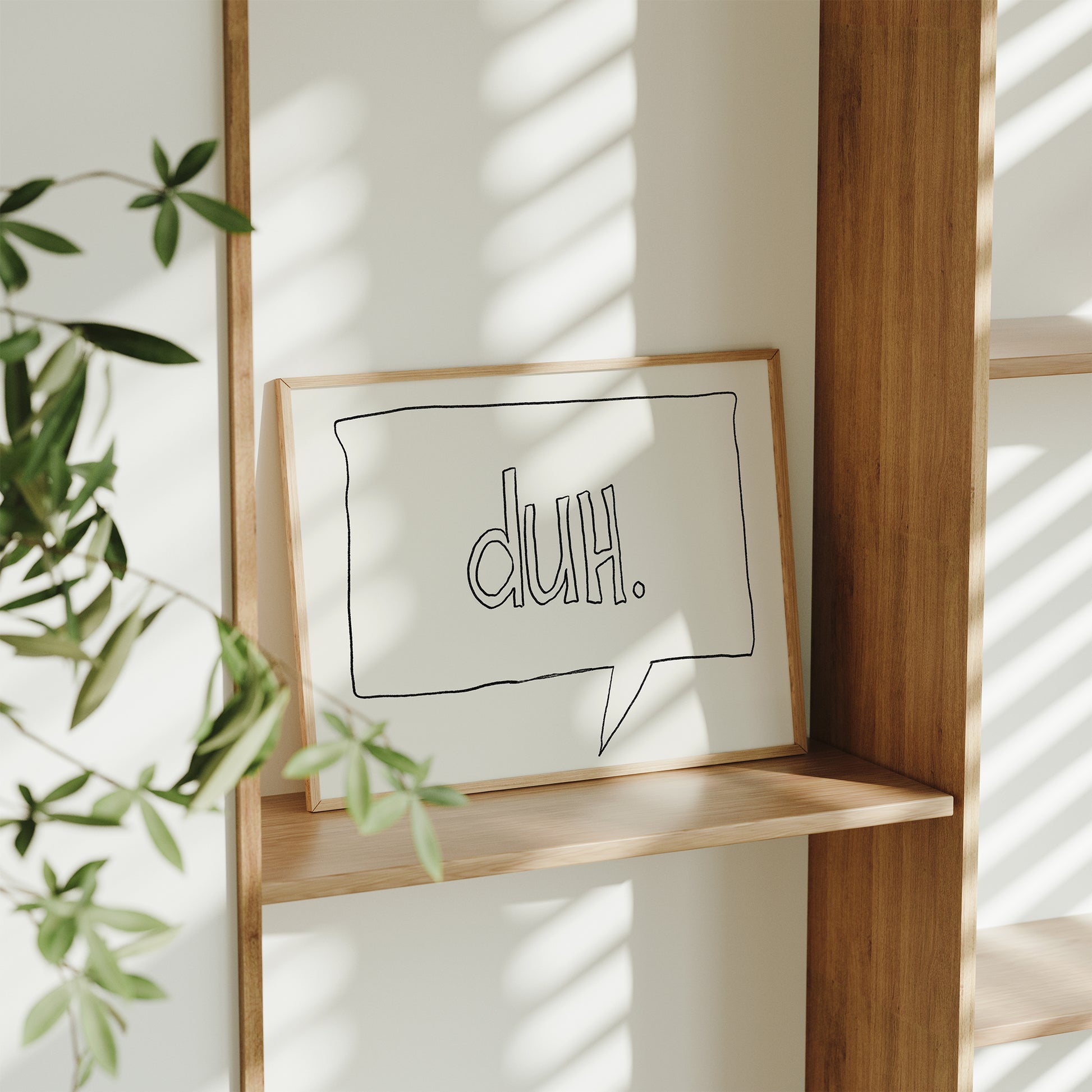 Minimalist “DUH” poster with hand-drawn style text on matte paper for office or home wall decor.