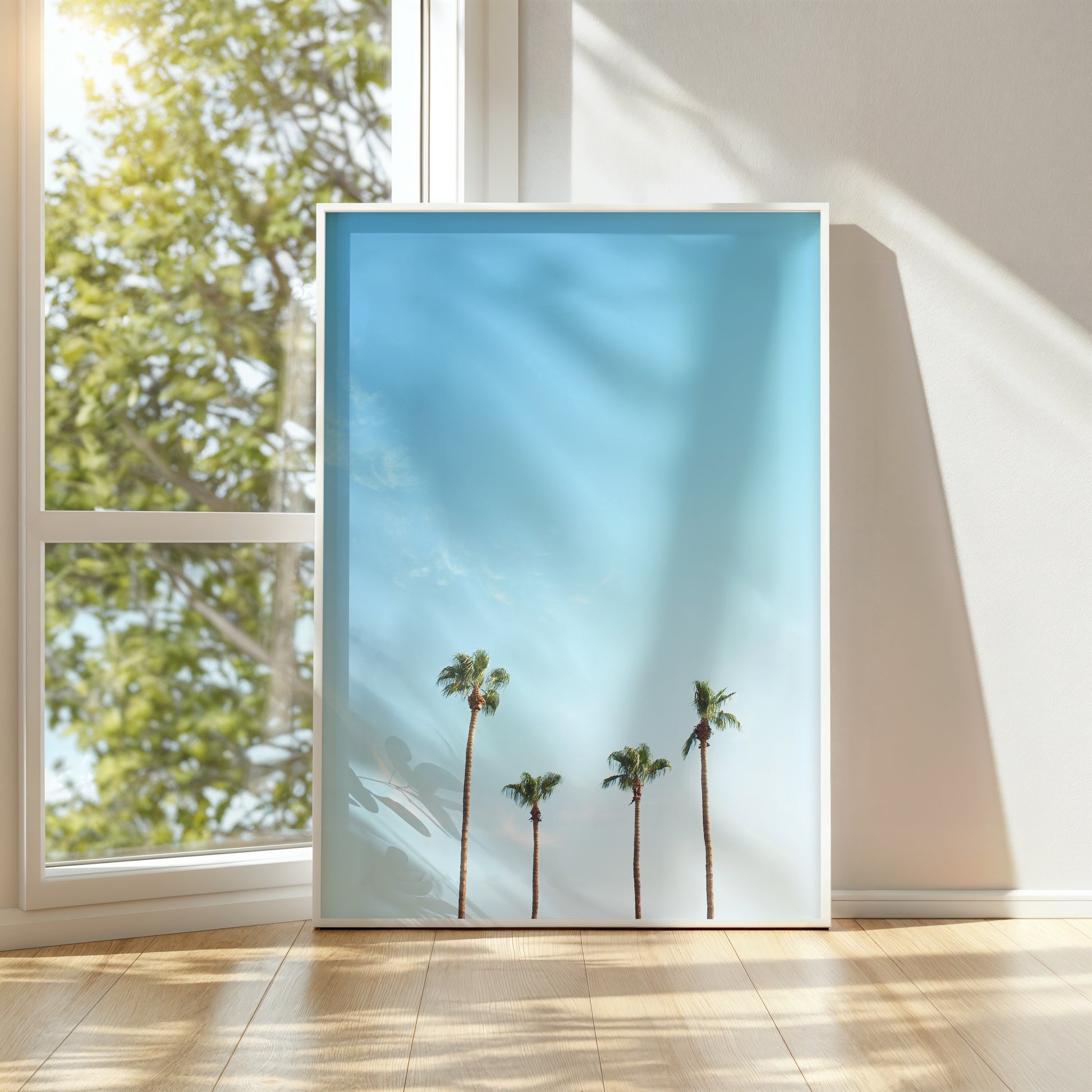 Minimalist palm tree print with four trees under a serene blue sky titled FAMiLiA, perfect for modern and coastal spaces.