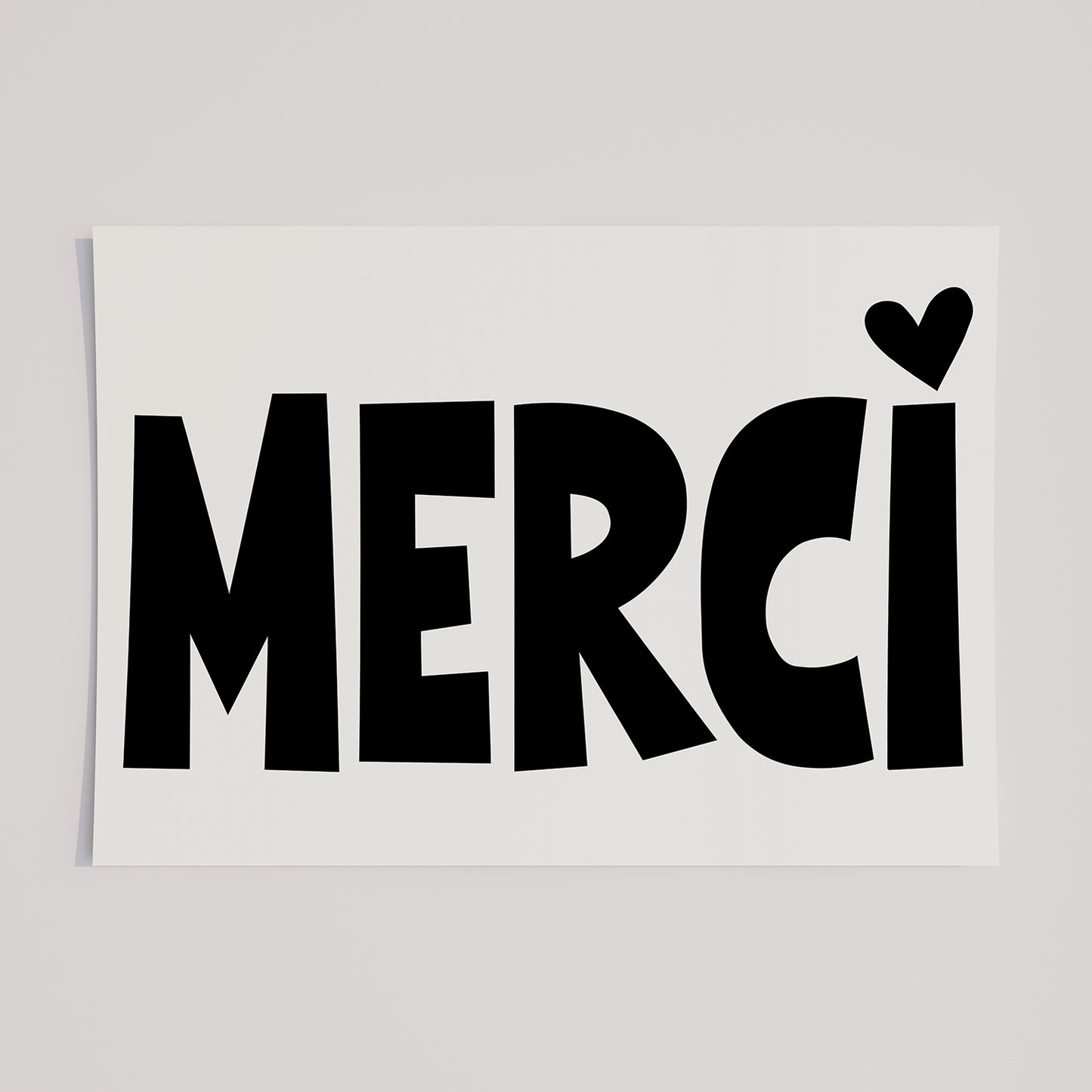 MERCi poster with bold black letters and a heart dotting the i, stylish gratitude artwork for home or office decor.