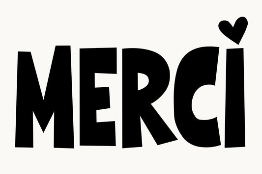 Bold black-and-white MERCi poster featuring oversized typography and a heart dotting the i for stylish gratitude.