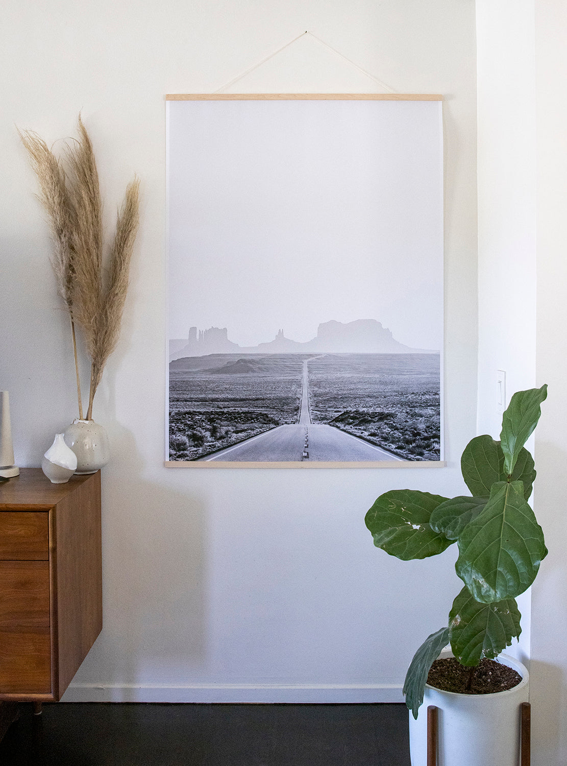 ROAD TRiP black-and-white photo of open road to Monument Valley, perfect for modern interiors and travel lovers.