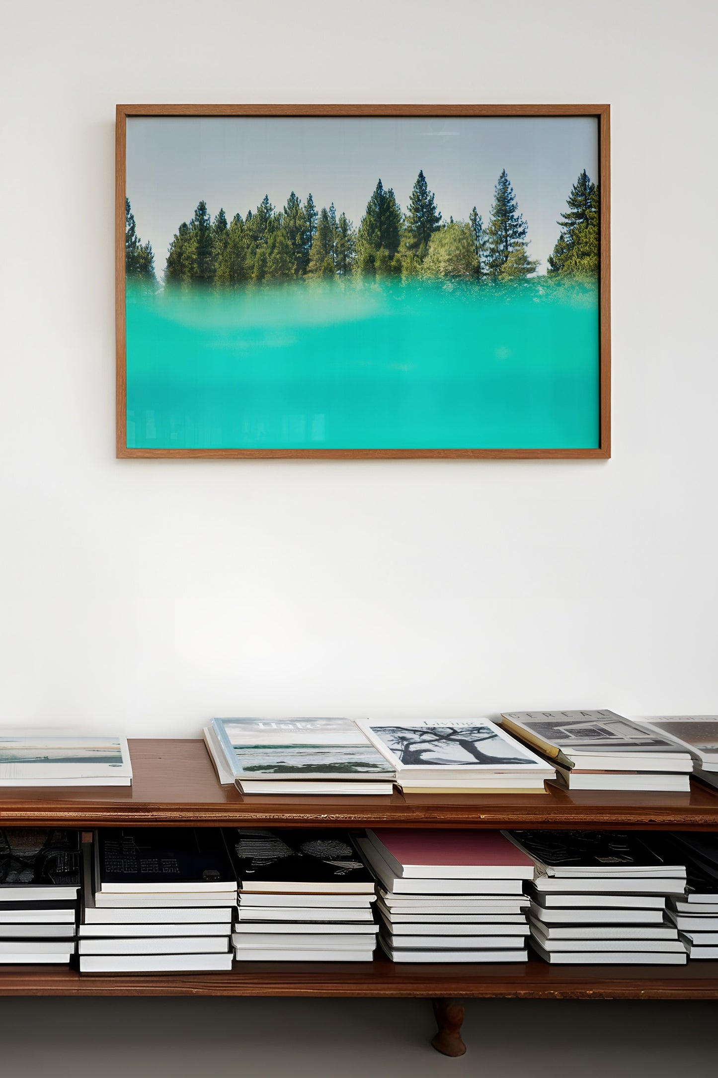 SUGAR PiNE framed artwork featuring turquoise water and tall pine trees in a modern nature-inspired design.
