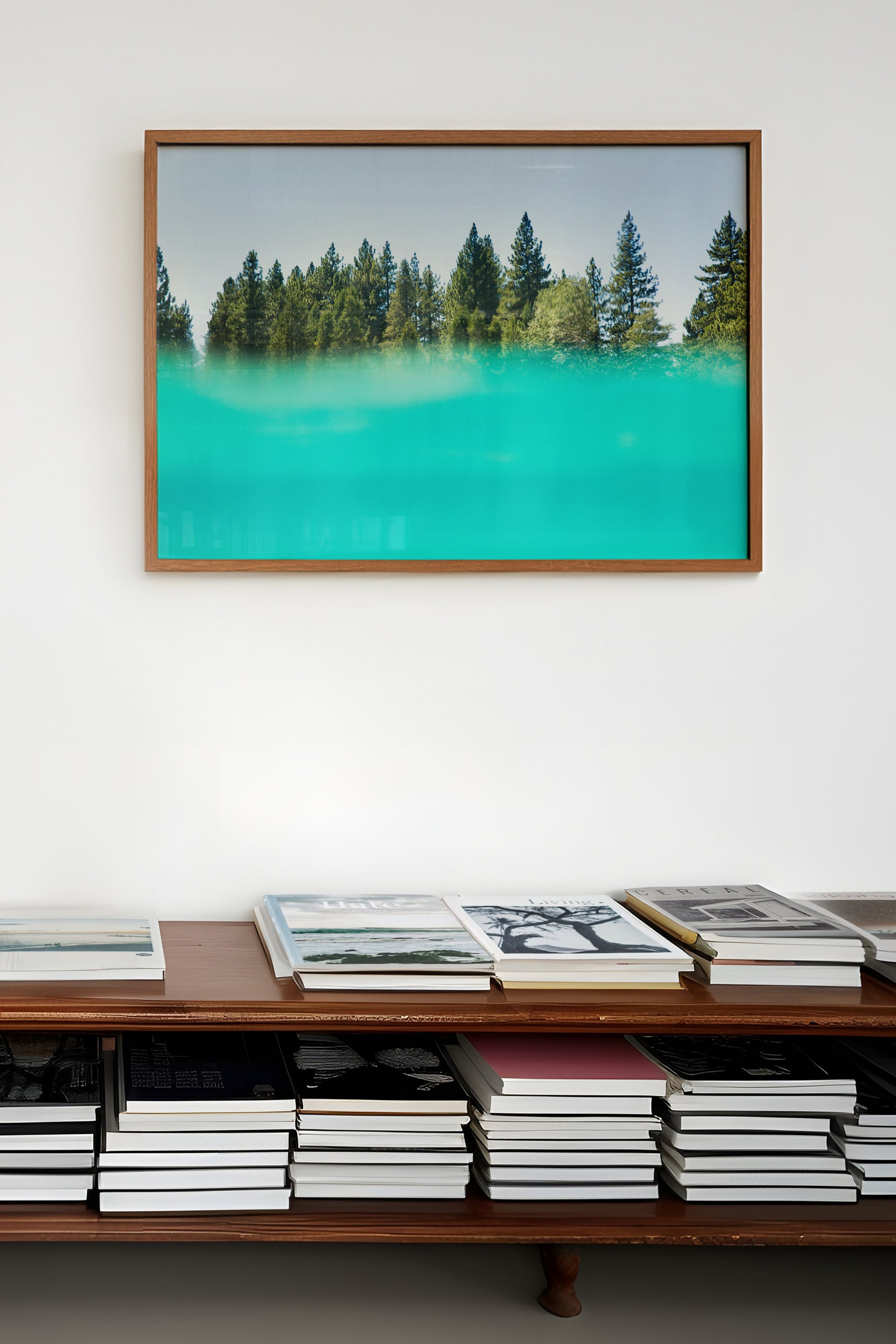 SUGAR PiNE framed artwork featuring turquoise water and tall pine trees in a modern nature-inspired design.