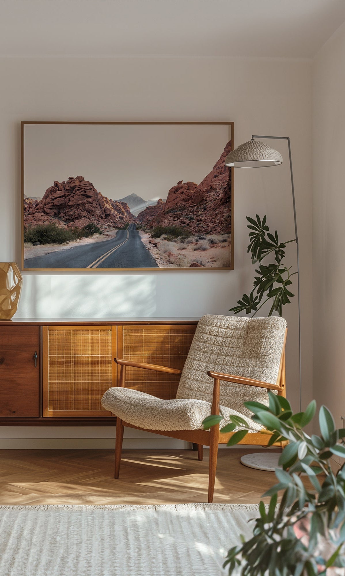 THE ROAD framed desert landscape art featuring a winding road through red rock formations in a minimalist living room.