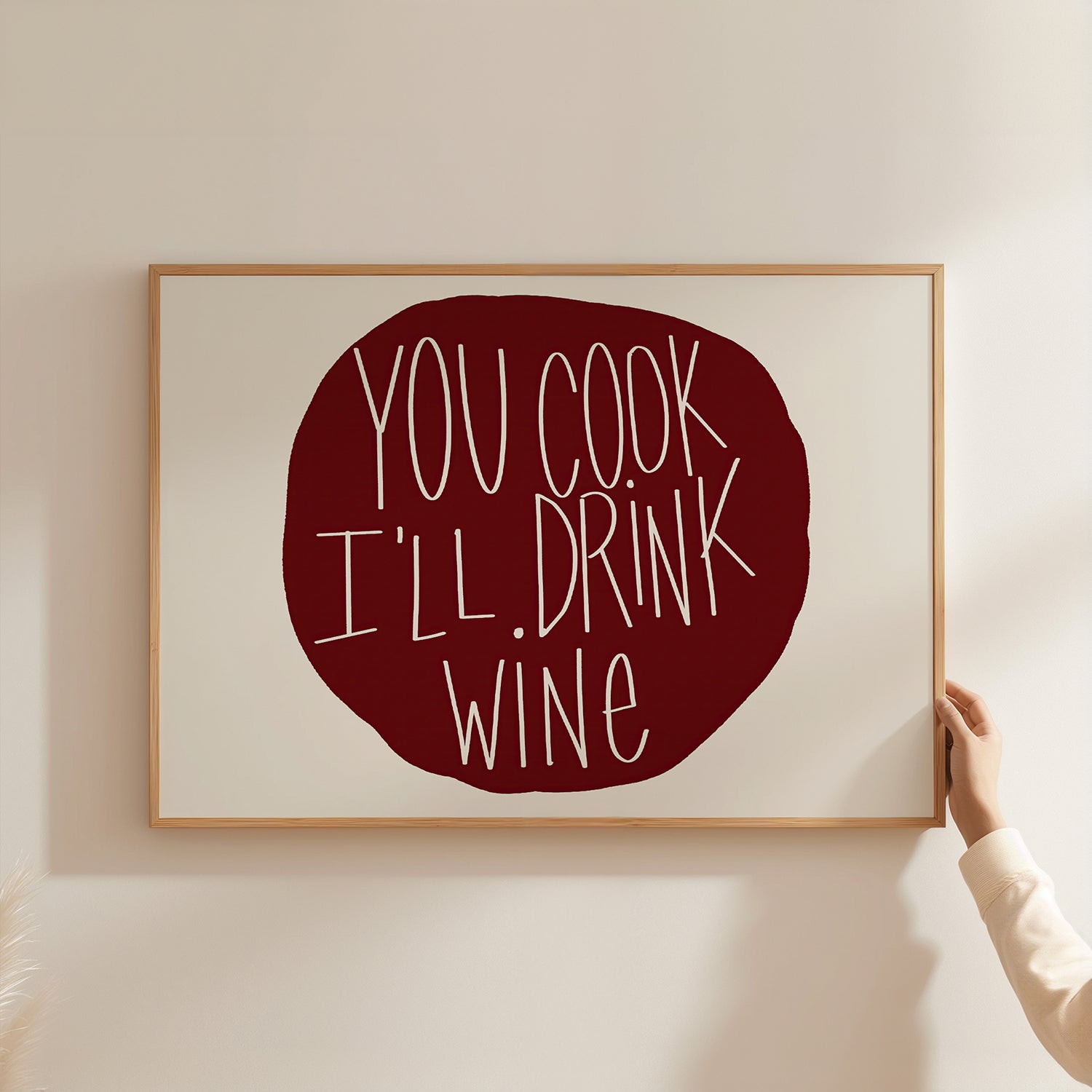 Framed "YOU COOK I'LL DRINK WiNE" poster with burgundy typography, perfect kitchen or dining wall art.