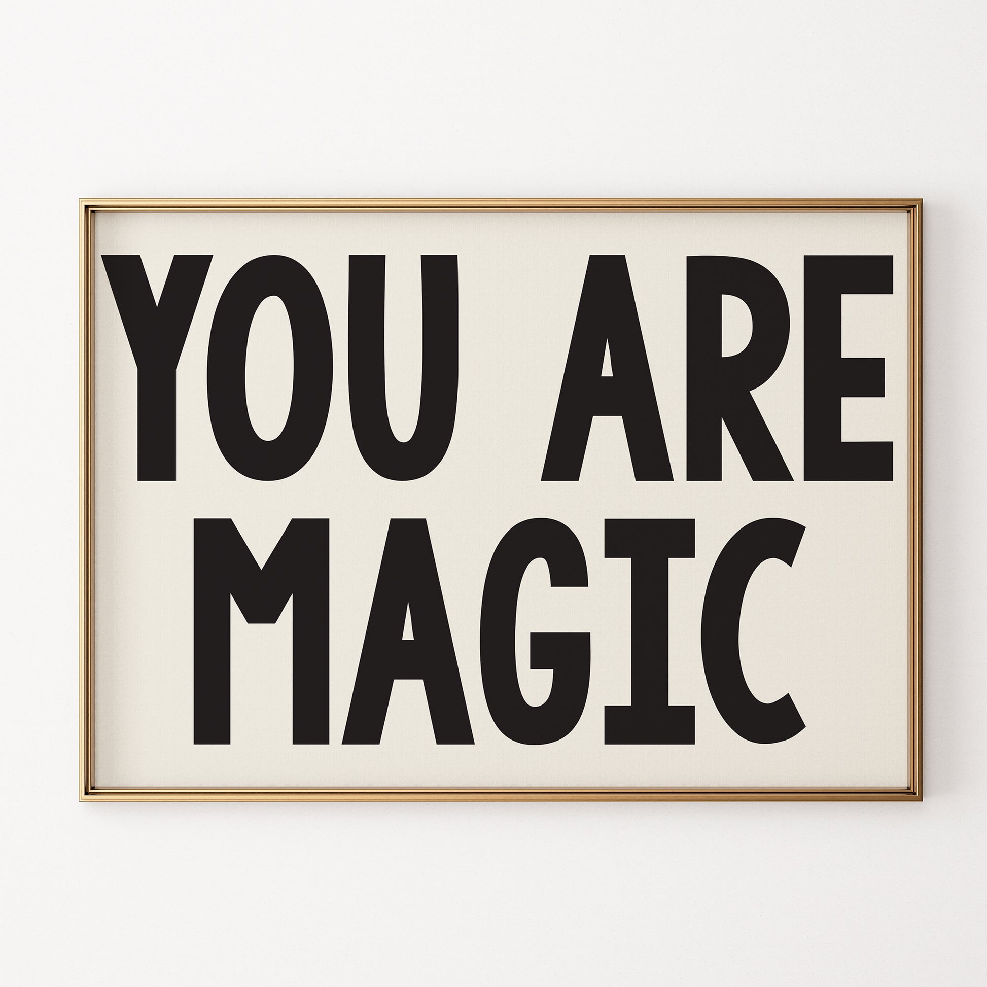 YOU ARE MAGiC poster with bold black text on white background, minimalist typographic motivational wall art.