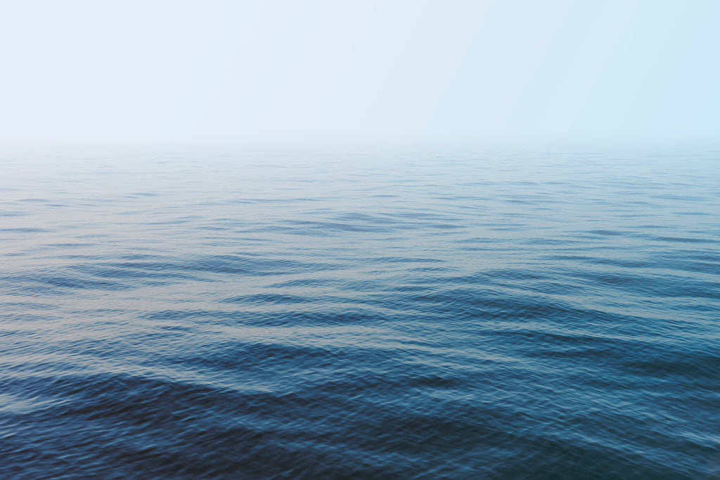 vast blue ocean minimalist modern wall art by denise crew