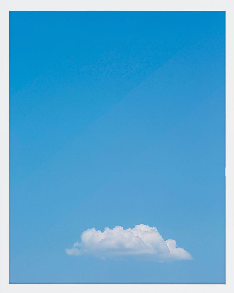 A single cloud amongst a bright blue sky. Available in square and vertical formats from sizes 5x5 up to 30x45. Printed on archival luster matte paper. - PRINTSHOP by Denise Crew